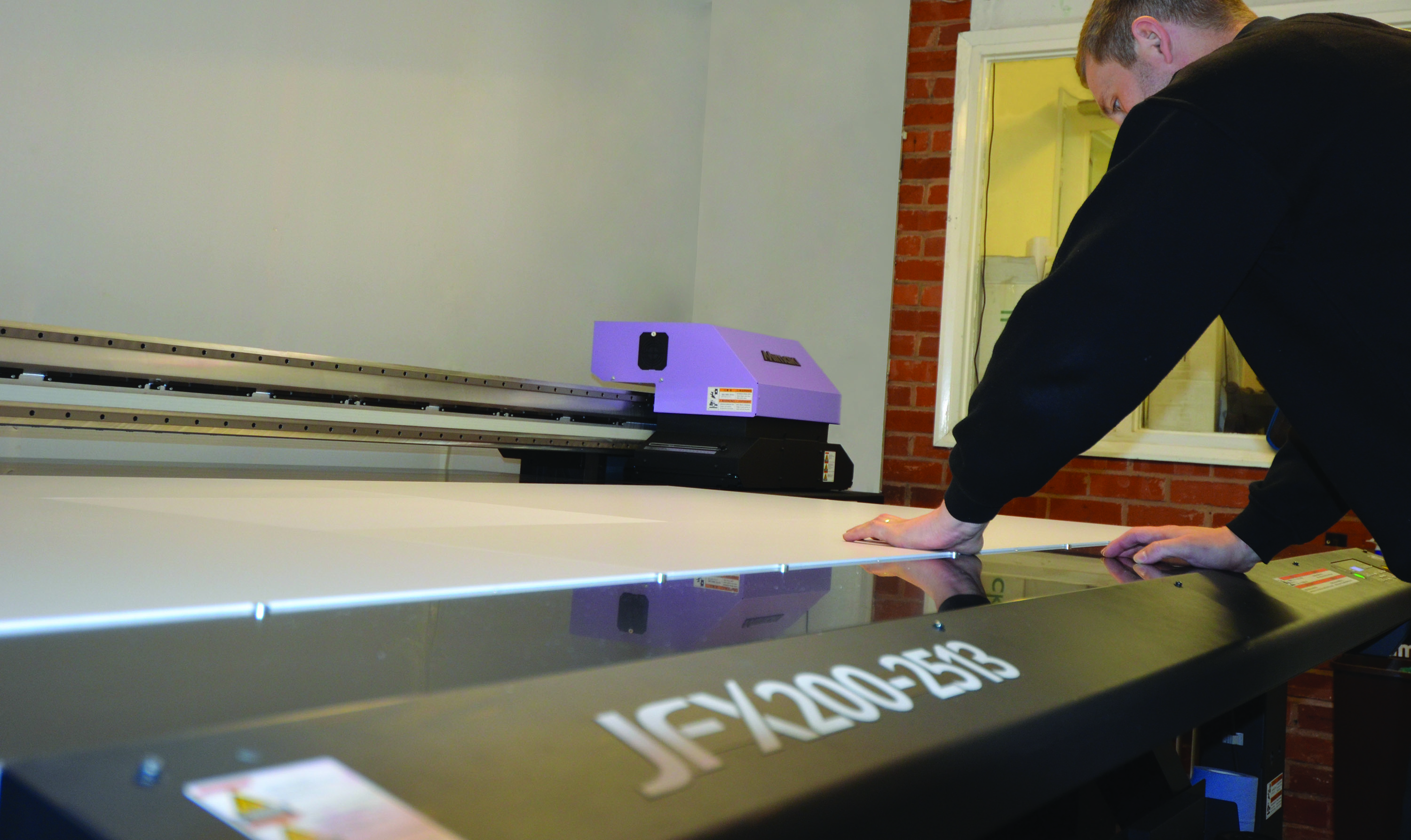 Matt Shaw sets up a new print job on the Mimaki JFX200 