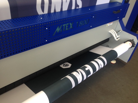 Hanging fabric banners in production on the MTEX 1800 direct-to-textile printer 