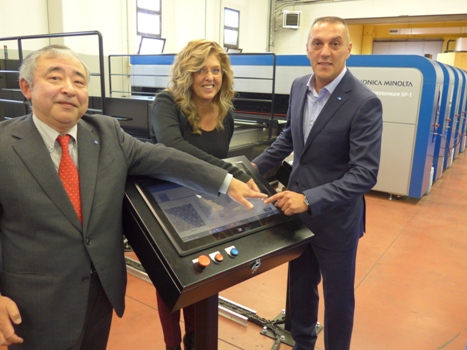 Mrs. Elena Daddi, Bregnano Town Mayor, pushes the button to officially launch the new €5m textile innovation centre at Como flanked by Konica Minolta’s Akiyoshi Ohno (left) and Enrico Verga